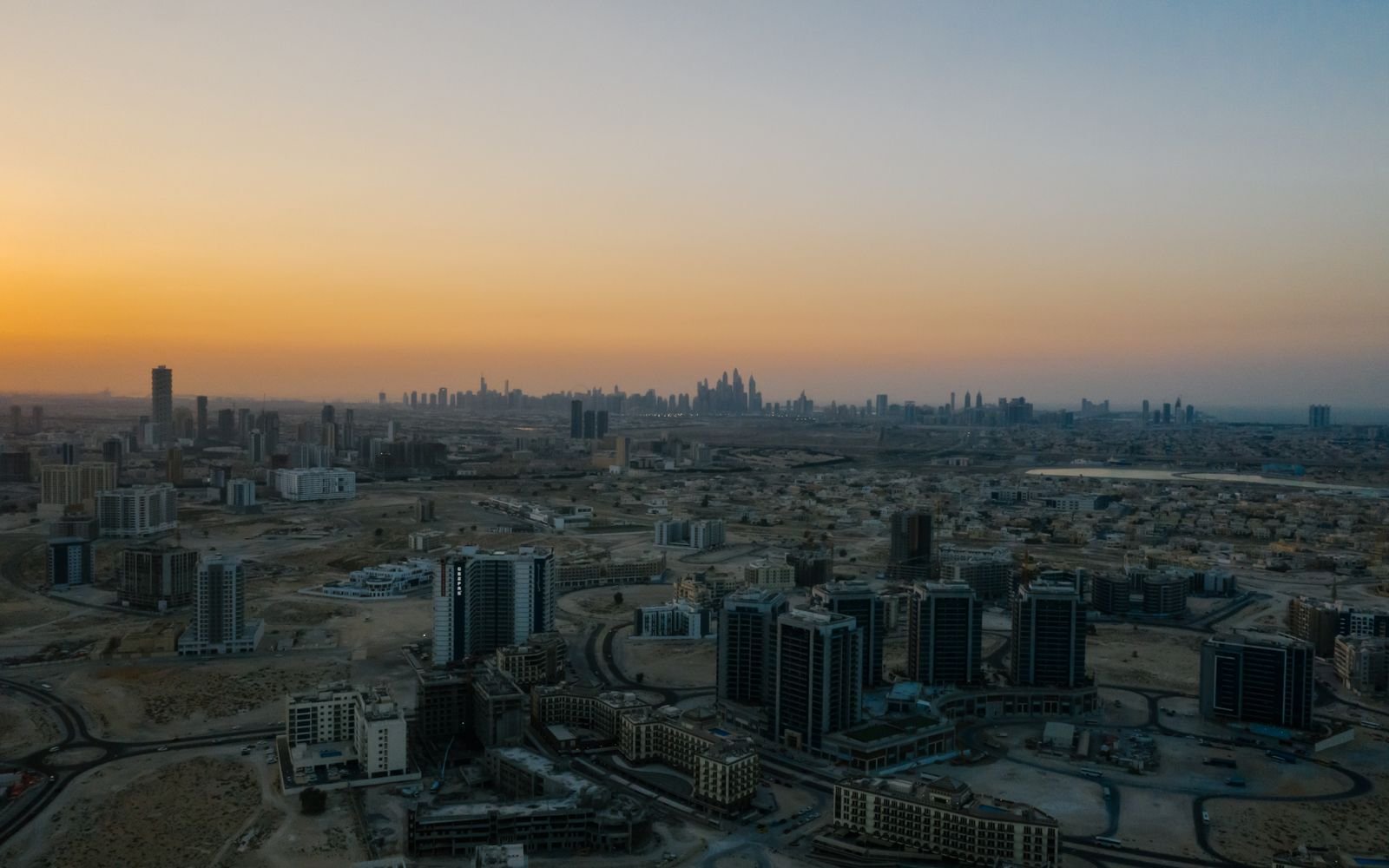 Dubai city development showing new and completed residential towers