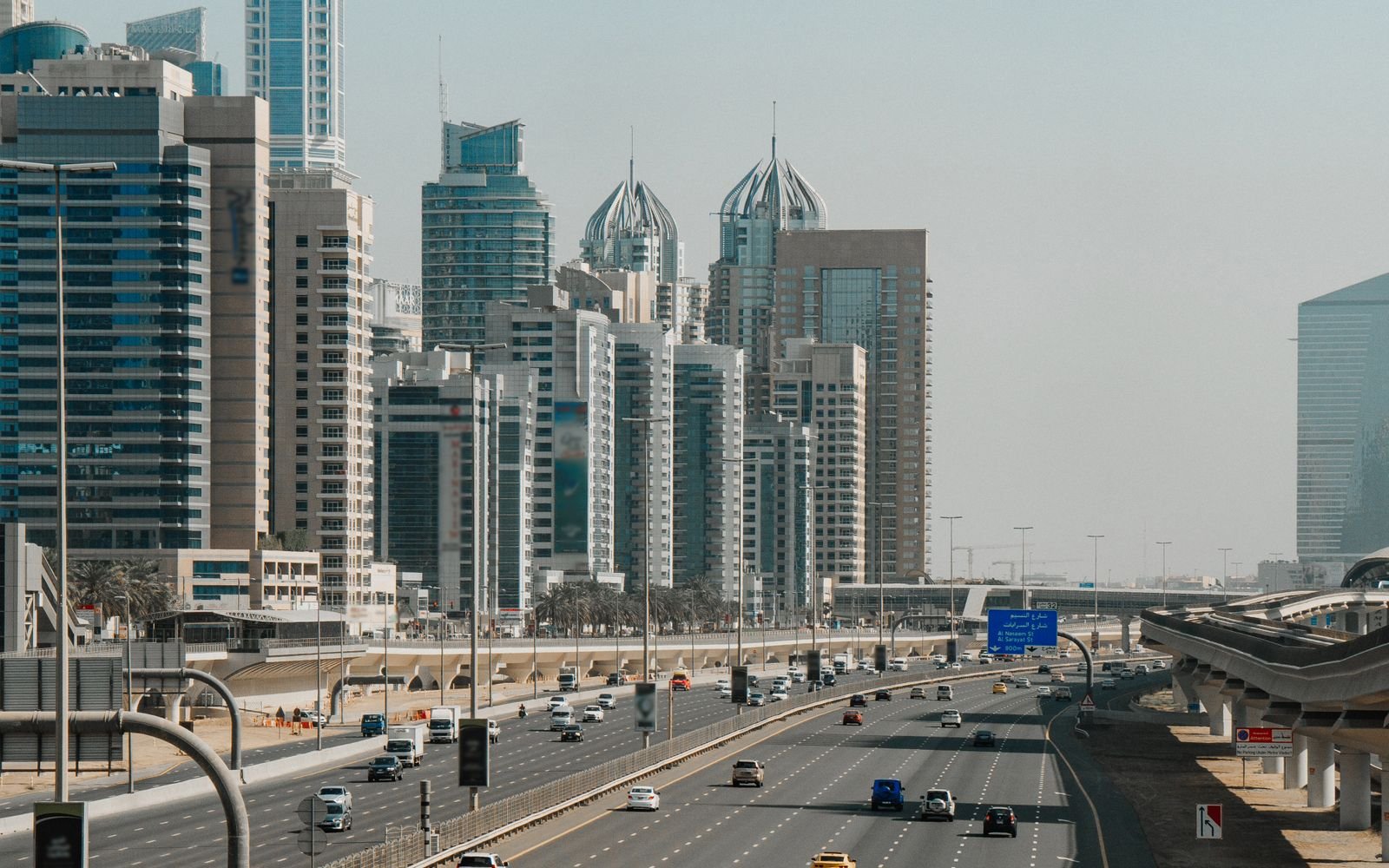 Dubai towers and roads for an off-plan property resale guide